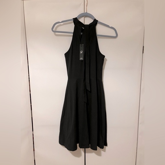 Ouges knee length fit and flare dress. - Picture 1 of 5
